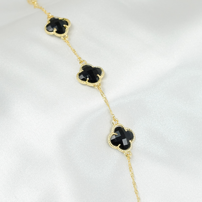 Pulseira Emeline Dourada Trevos Zircônia Preta
